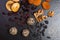 Theme sweet dessert made from natural products without sugar. Macro close-up of deserts ball round candy truffle on a black plate