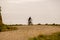 Theme tourism and cycling on mountain biking. guy rides uphill on a rocky, rocky road against the background of the Mediterranean