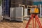 Theodolite at the construction site. construction measuring tool. Surveyor equipment at construction site