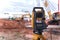 Theodolite equipment  of Surveyor builder engineer during surveying work in construction site