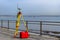 Theodolite measuring instrument. Modern geodetic device on the quay