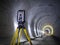 Theodolite at underground railway tunnel construction work