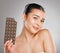 Is there anything sweeter than chocolate Yes, me. Studio shot of an attractive young woman eating a slab of chocolate