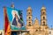 There is a banner of the virgin of Zapopan in front of the basilica.