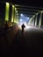 There is night veiw of the road and bridge with light