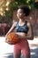 Theres another game around every corner. Cropped shot of an attractive young female athlete standing on the basketball