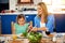 Theres lots more if you want seconds. a mother serving food to her little daughter at home.