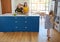 Theres something magical about mealtimes...a little girl dancing while her mother and grandmother cooks in the