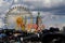 theresienwiese, munich, germany, 2019 april 27: St Paul church with ferris wheel in the background from the flea market in bavaria