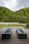 Thermal bath tubs with a view of the river and Swiss nature.