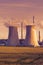 Thermal power plant with grain field at sunset
