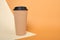 thermo mug made of cork on a beige and brown background