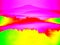 Thermography photo. Animal view. Spring landscape. Hills, forest and fog with chaned colors to ultraviolet.