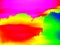 Thermography photo. Animal view. Spring landscape. Hills, forest and fog with chaned colors to ultraviolet.