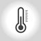 Thermometer icon on gray background.