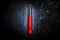 Thermometer measuring air temperature isolated on grunge  background. High temperature growth