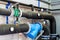 Thermometer, pipes and faucet valves of heating system in a boiler room