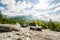 Theth, Albania - July 24, 2014. Two vintage off road cars on the dirt road in albanian mountains