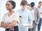 Theyre all focused on reaching their goals. Shot of a group of businesspeople waiting in line at an office.