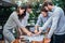 Theyre all on the same page. a group of business colleagues having a meeting outdoors at a cafe.