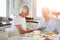 Theyre becoming tech savvy seniors. a senior couple using a digital tablet while having breakfast at home.