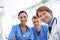 Theyre the best medical team. A medical team standing in the hospital corridor.