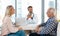 Theyre in good hands. a handsome male doctor consulting with a couple in his office.