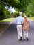 Theyre lost in a world of their own. Rearview shot of senior couple taking a walk together.
