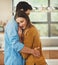 Theyre so in love. an affectionate young couple embracing in their kitchen.