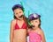 Theyre sisters who love swimming. two young sisters swimming together.