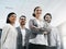 Theyre a team built for success. Low angle shot of a group of businesspeople standing in the office.