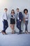 Theyre a team built to last. Portrait of a diverse group of businesspeople standing against a grey background.