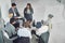 Theyre a team of thinkers. High angle shot of a group of coworkers talking together while sitting in a circle in an