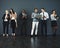 Theyve all got smart ways to do business. Studio shot of a group of businesspeople using various digital devices against