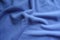 Thick blue fleece in soft folds