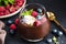 Thick Chocolate Mousse With Cream Berries And Pistachios