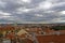 A thick cloud cover over the crowded Prague Castle complex