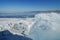 Thick crack iceberg sheet in Baikal Lake in winter sunny day