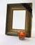 Thick gold picture frame candle