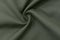 Thick green denim, background, folds