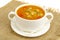 Thick homemade vegetable soup with rice, pumpkin and tomatoes