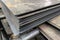 thick hot rolled steel sheets stack corner, close-up