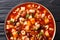 Thick Italian Pasta fagioli soup close-up in a bowl. horizontal top view