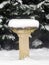 Thick snow on a birdbath