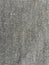 Thick woolen fabric of gray color. Textural abstract background.