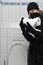 Thief stealing valuable Toilet paper during Coronavirus