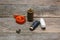 Thimble and spools of thread on an aged wooden surface