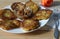 Thin brown potato hashbrown pancakes with onion and lard