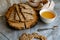 Thin crispbreads with seeds and sesame seeds, a healthy delicacy with vitamins and honey.  Food in an interesting composition