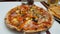 Thin and crispy crust Pizza with Mozzarella, Mushrooms, corn onion chesee peperoni